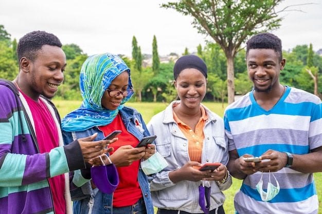 Friends using mobile internet together